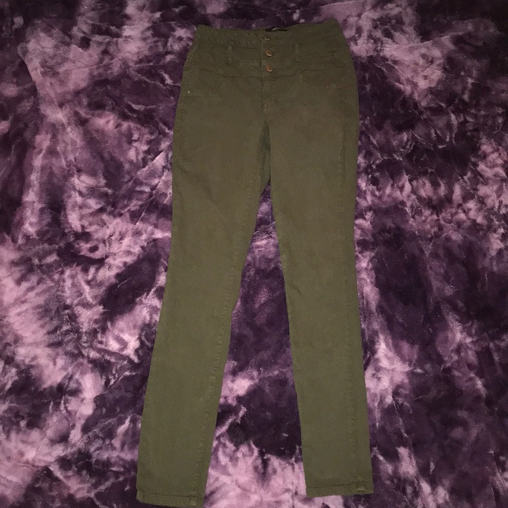 Dark green high waisted jeans.